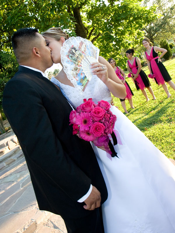 bride and groom kissing - mexican tradition